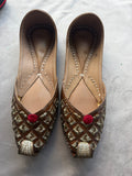 Gold Embroidered Punjabi Jutti – Brown Leather with Red Pom Pom